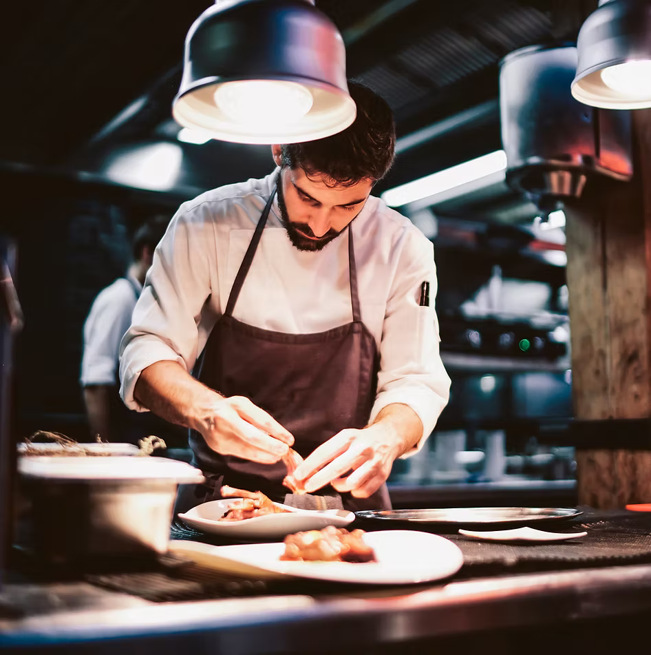 Chef preparing food in a professional kitchen